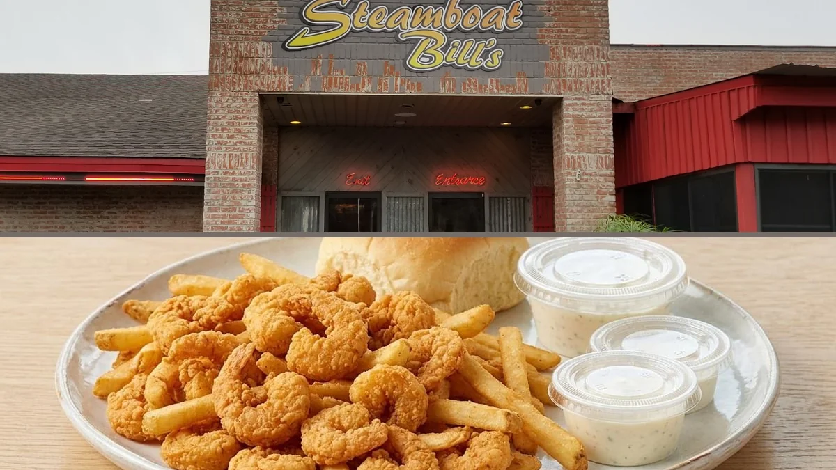 A basket of fried appetizers beside dipping sauce.
